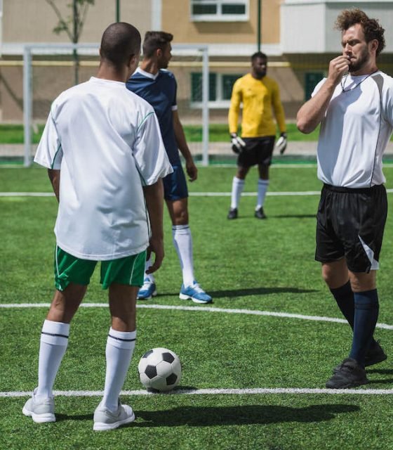 group-of-soccer-players-during-soccer-match-on-pit-2022-04-21-08-17-47-utc-1.jpg